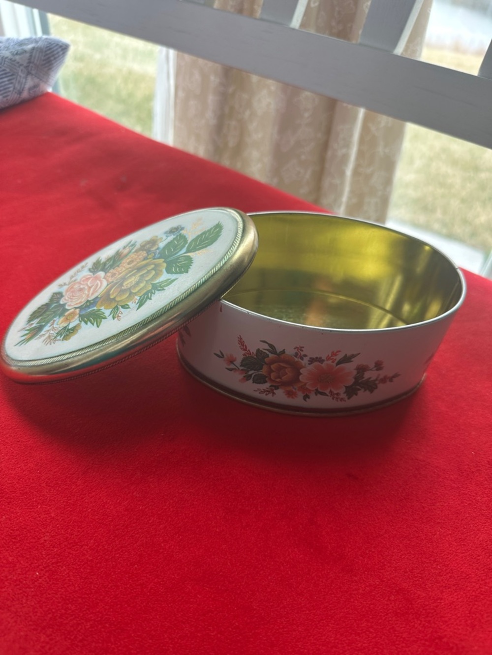 vintage Meister oval tin,floral design on both the lid and sides mad in Brazil